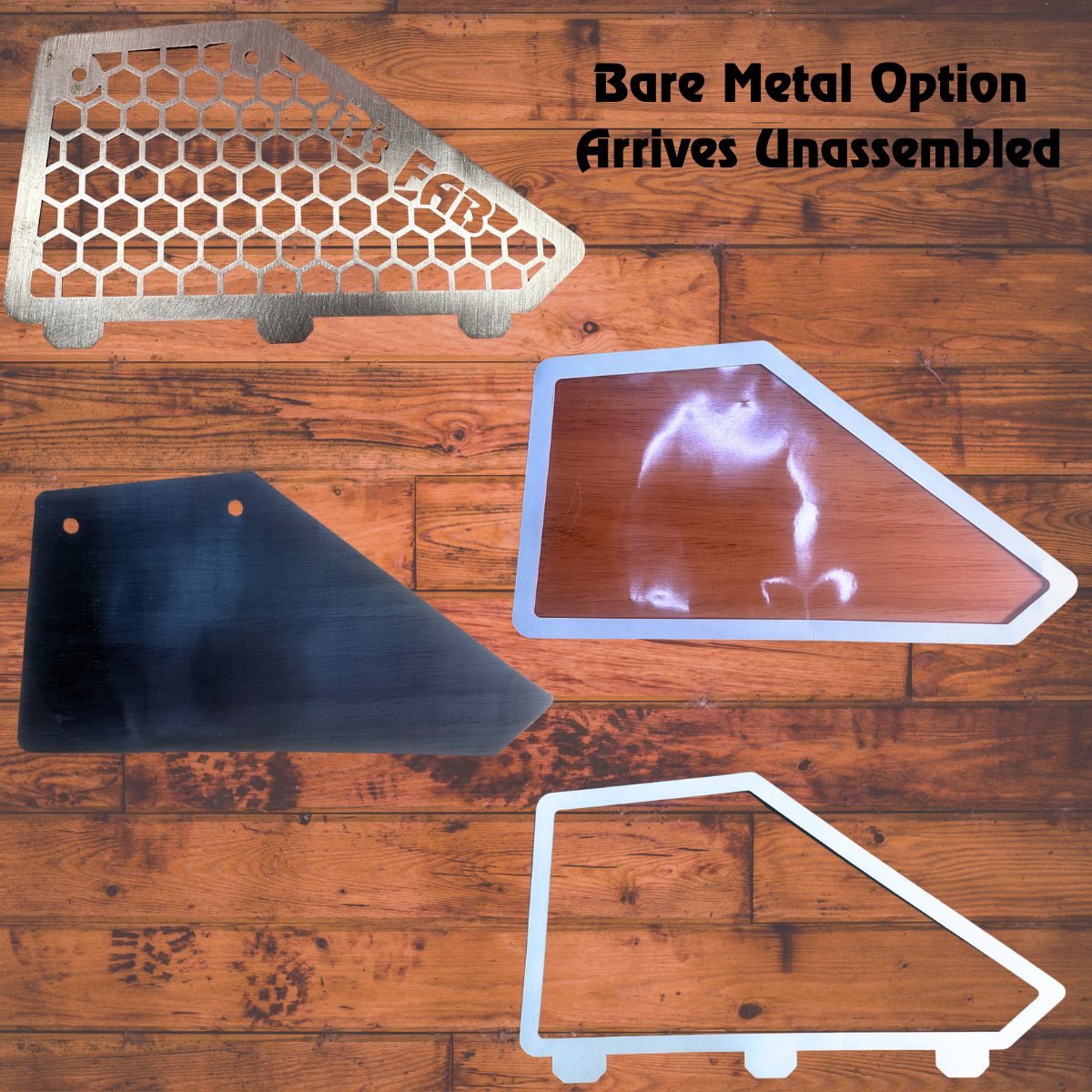 Unassembled bare metal car fabrication components on wooden background.